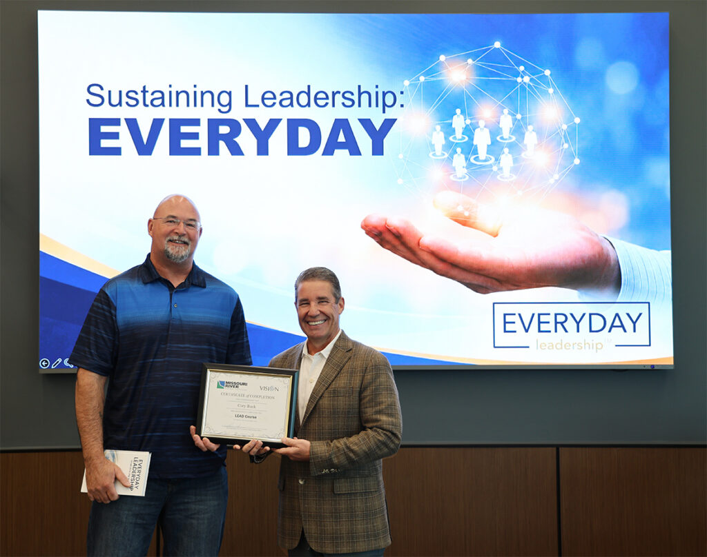 Cory Buck receives a leadership award.